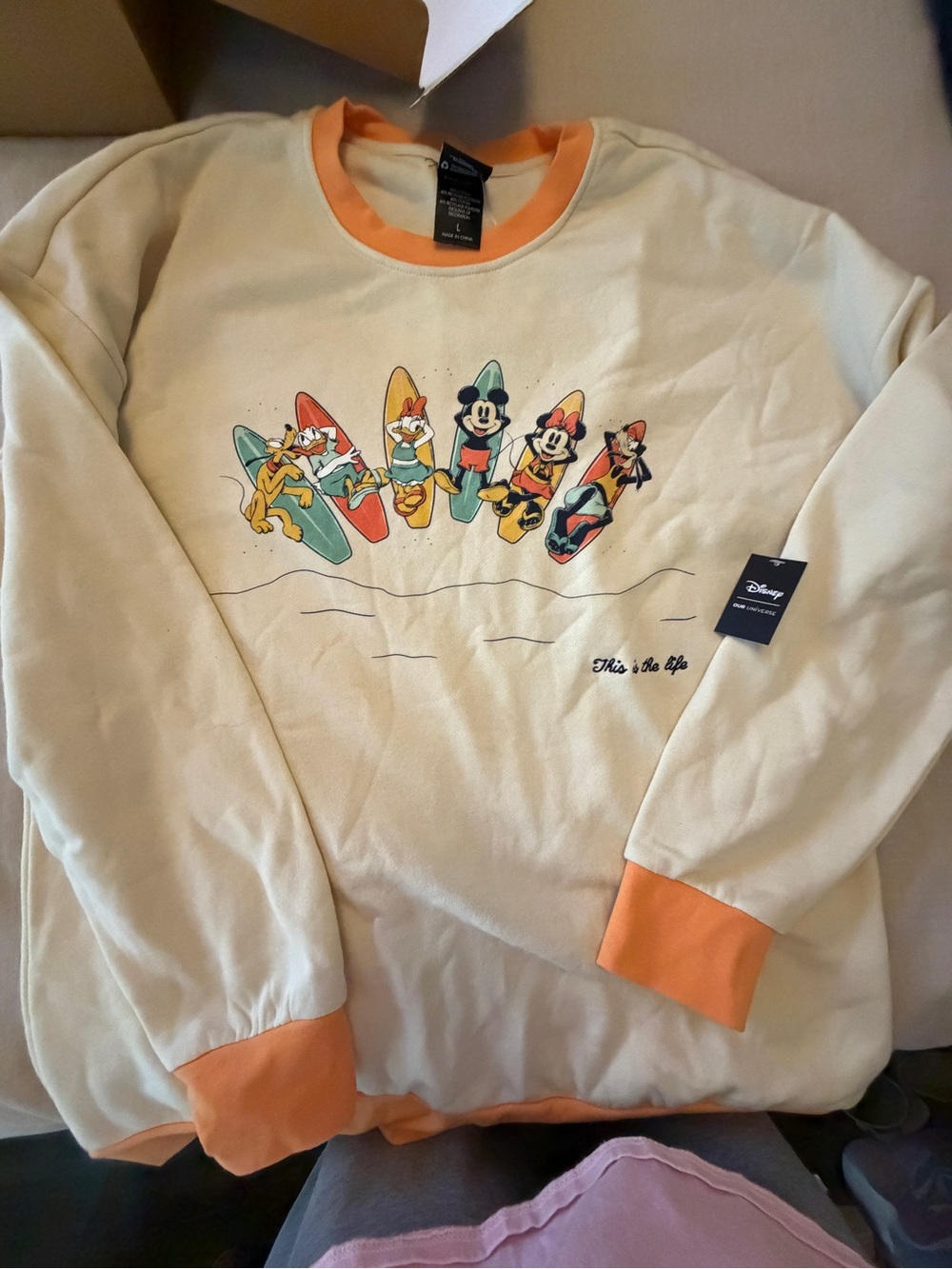 Disney Men’s Cream Crewneck Sweatshirt with Orange Trim and Surf Graphic